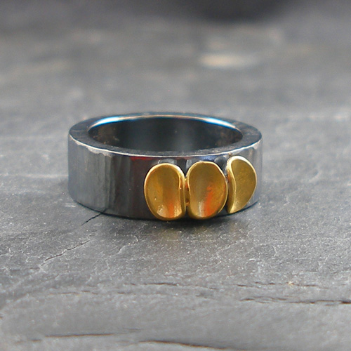 Oxidised silver wide Cluster ring with 3 gold plated pods by Jenifer Wall