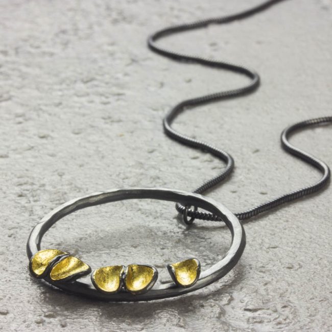 Oxidised silver and gold leaf round cluster pendant