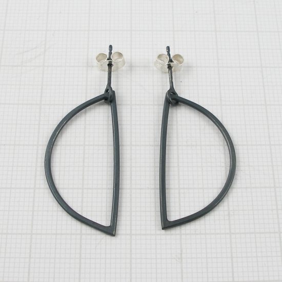 Half circle wire shape oxidised silver earrings by Annabet Wyndham