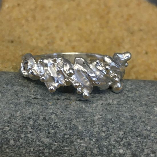 Silver shell ring by Milly Munday