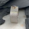 Silver and 18ct gold seam ring with salt & pepper rosecut diamond by Jenifer Wall