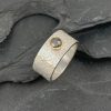 Silver and 18ct gold seam ring with salt & pepper rosecut diamond by Jenifer Wall