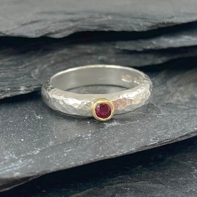 Hammered silver D-shaped band with round ruby by Jenifer Wall