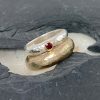 D-shaped hammered rings by Jenifer Wall