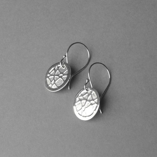 Textured silver oval drop earrings by Rebecca Halstead