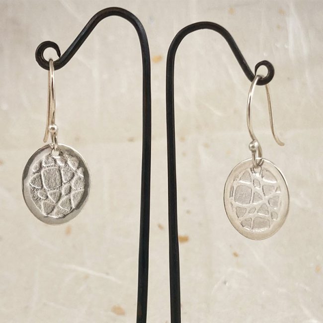 Textured silver oval drop earrings by Rebecca Halstead