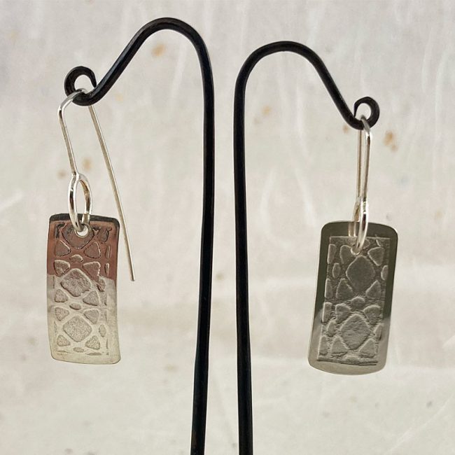 Textured silver rectangular drop earrings by Rebecca Halstead
