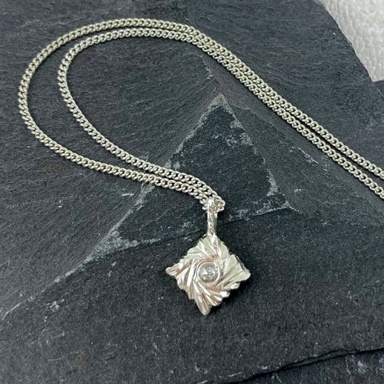 Carved Square Rocks silver pendant with salt and pepper diamond by Hannah Felicity Dunne
