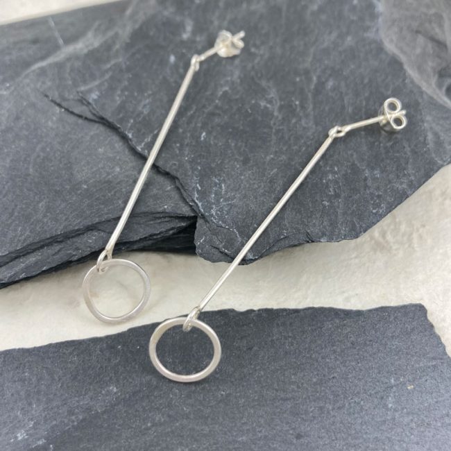 Silver circular link long drop earrings by Samantha Maund