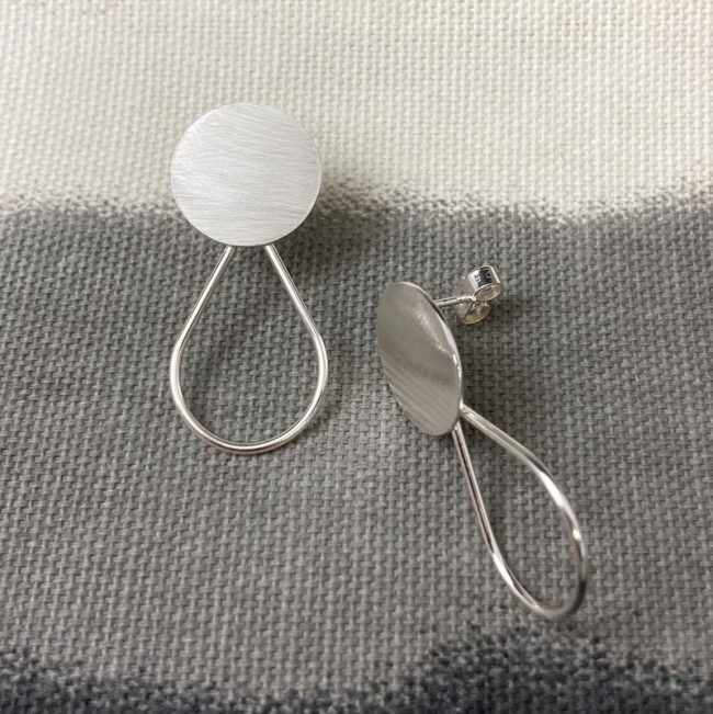 Silver Circle and teardrop outline stud earrings by Claire Lowe