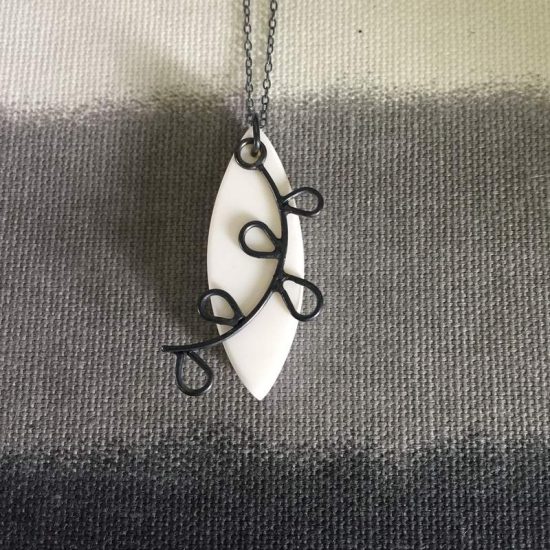 White resin & oxidised silver leafy pendant by Claire Lowe