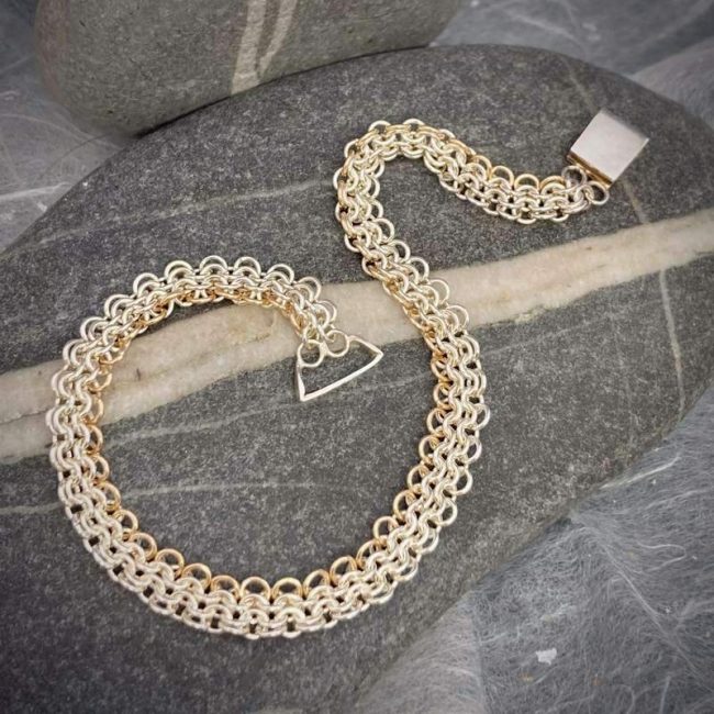 Edge chainmail bracelet in silver and 9ct gold by Corrinne Eira Evans