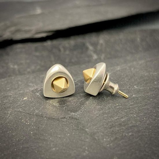 Idun silver and 18ct gold logo stud earrings by Annika Rutlin
