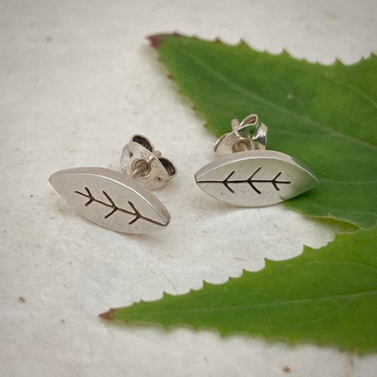 Tiny leaf stud earrings in silver by Diana Greenwood