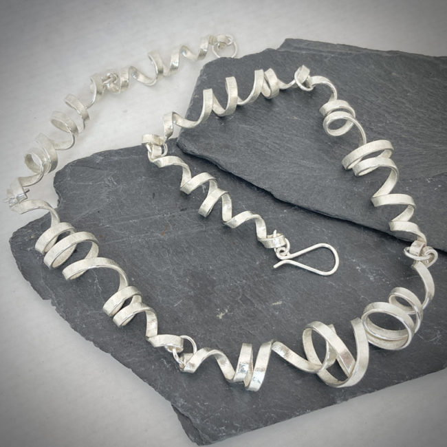 Full spin silver necklace by Frances Stunt