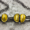 Cluster bar necklace in oxidised silver 22ct gold leaf - Image 2